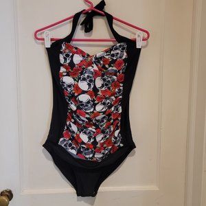 Black one piece swim suit with skulls and red roses